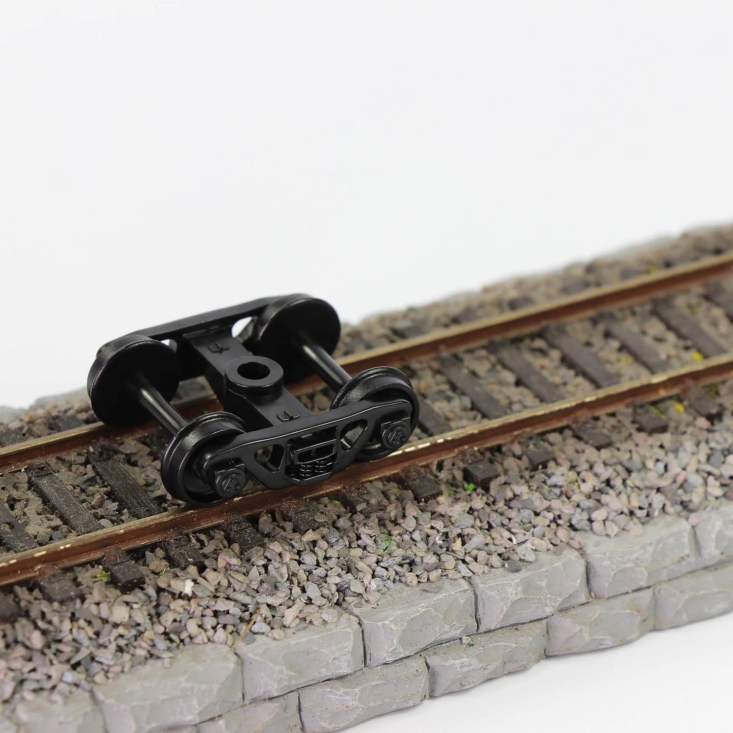 Evemodel 12pcs Model Trains HO scale 1:87 Roller Bearing Truck POM with 33" Plastic Wheels 4-Springs Bogies HP22HO