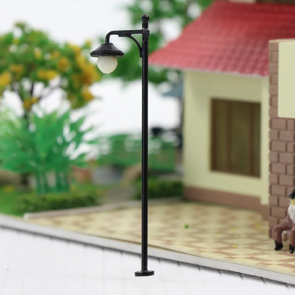 Evemodel 10pcs Model Railway HO Scale 1:87 Round Lamp Post Street Lights Warm LED 2.56In LYM22