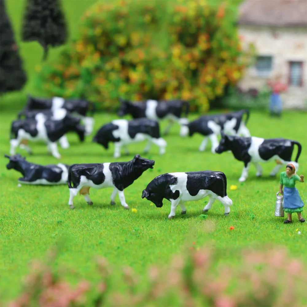 Evemodel AN8704 36pcs Model Trains HO Scale 1:87 Painted Herder Farm Animals Black White Cows